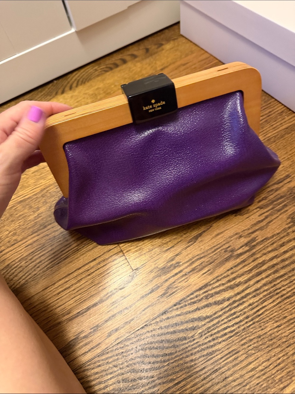 kate spade purple leather clutch with wooden frame and black clasp